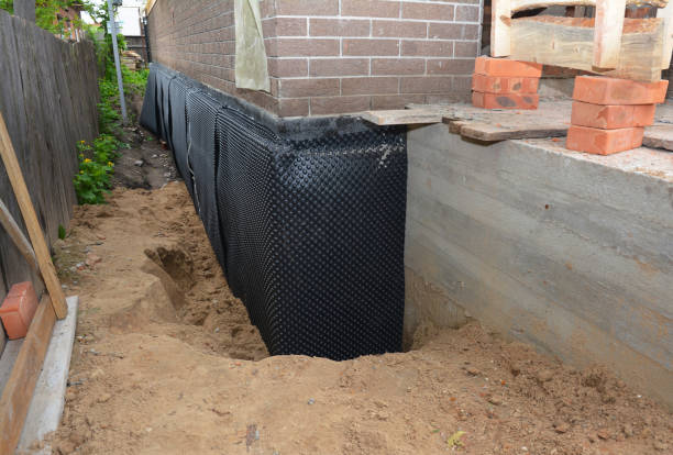 Happy homeowners after waterproofing job in Berkley